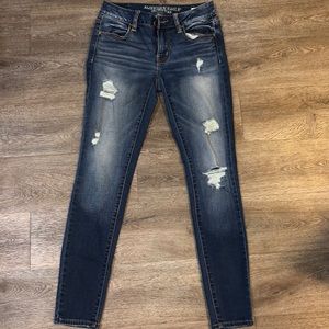 Skinny dark blue ripped American eagle jeans